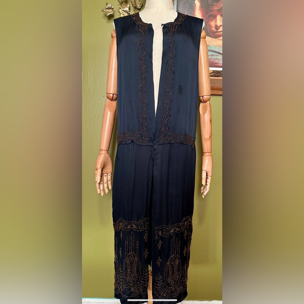 Original 1920’s black silk and bronze beaded flapper dress.